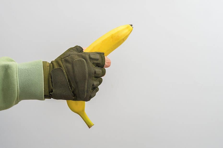 Seksuell respons: Bilde av en banan i en mannlig hånd med arbeidshanske på. Illustrerer den mannlige seksuelle responsen
