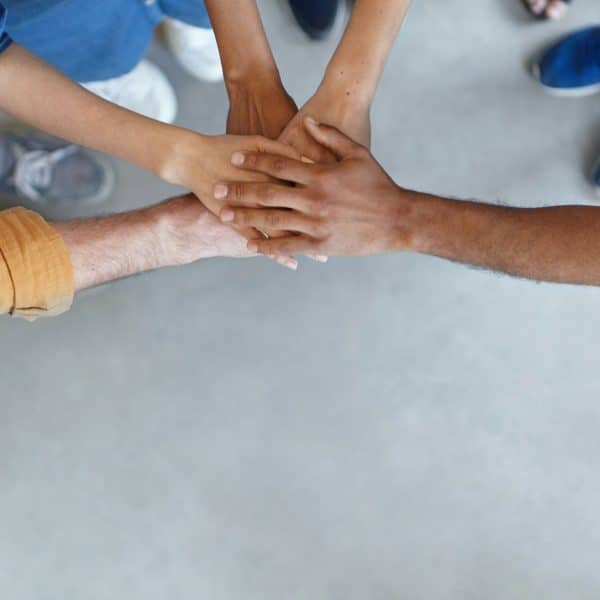 4 people holding hands partner swap